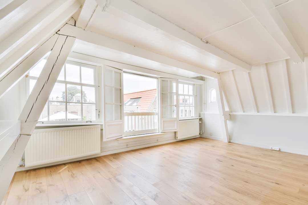 room-with-large-windows-and-parquet-flooring-2021-12-09-14-07-38-utc.jpg