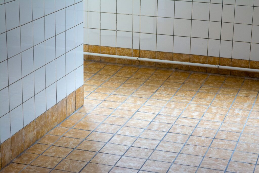 close-up of a seamless, low-VOC resilient sheet floor in a bright bathroom