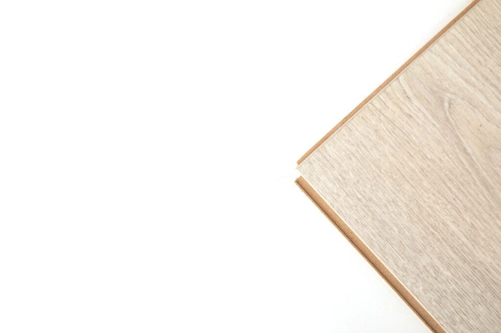A Homeowner's Guide to PVC Free Vinyl Flooring in Central Florida 2 side by side comparison of pvc free vinyl flooring and standard laminate samples