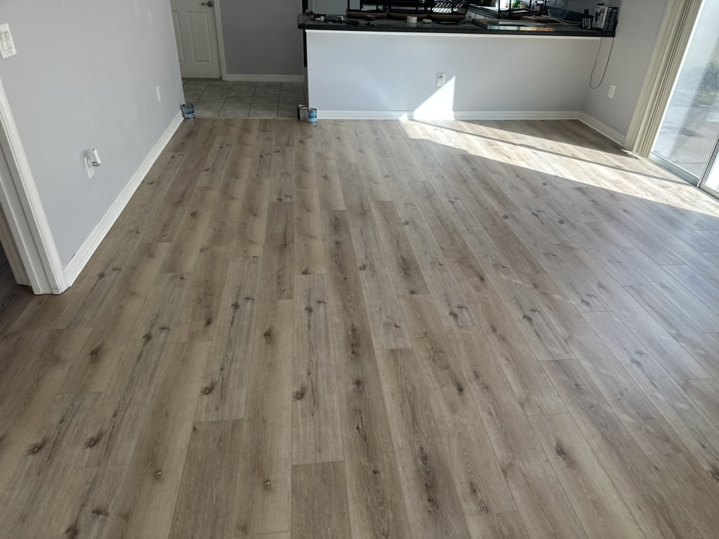 vinyl flooring installation in Ocala living room showing waterproof LVP planks